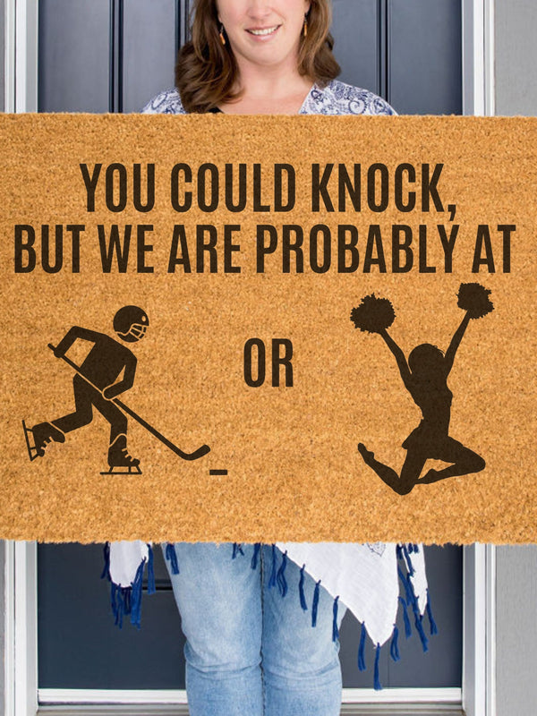 a door mat that says you could knock, but we are probably at or