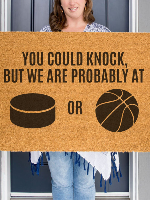 a door mat that says you could knock, but we are probably at or