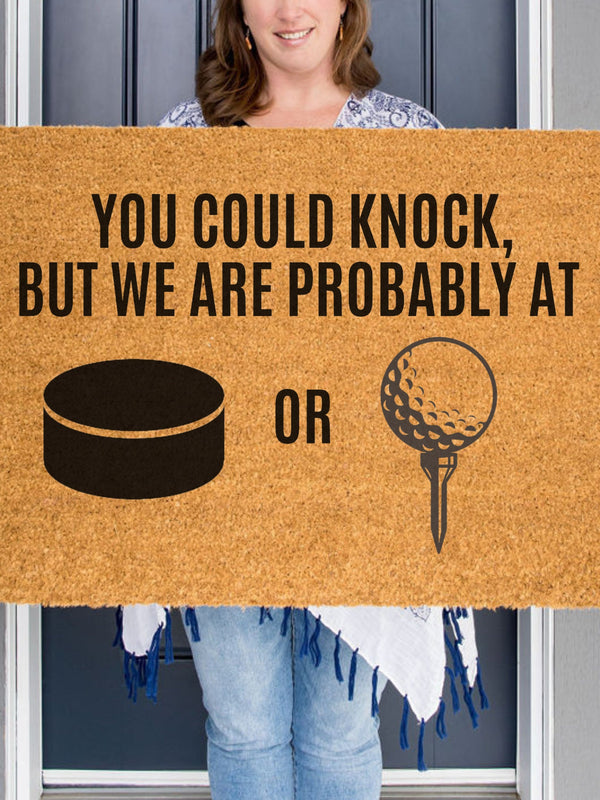 a door mat that says you could knock, but we are probably at or