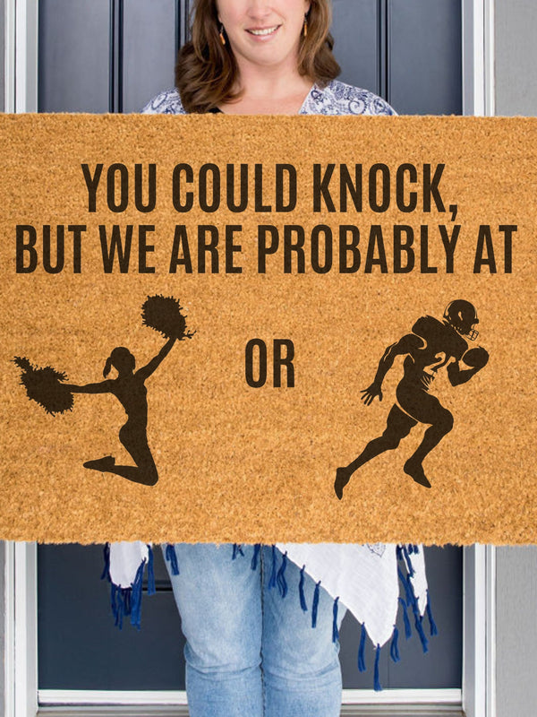 a door mat that says you could knock, but we are probably at or