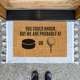 a door mat that says you could knock, but we are probably at or