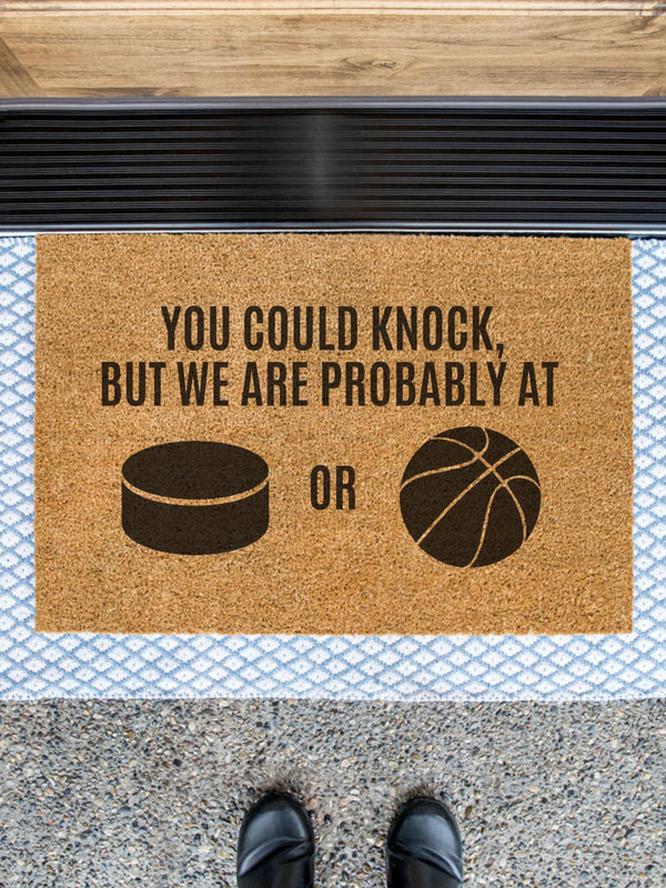 a door mat that says you could knock, but we are probably at or