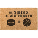 a door mat that says you could knock, but we are probably at or