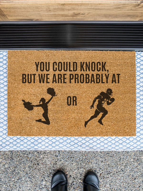 a door mat that says you could knock, but we are probably at or